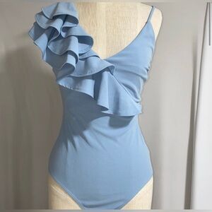 One piece cut out one shoulder form fitted bodysuit.